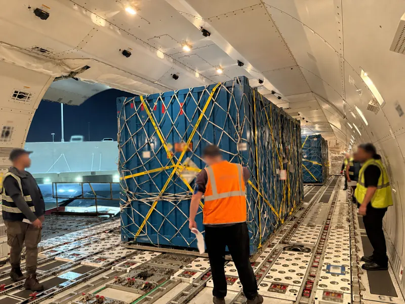 Air cargo team coordinating the loading process