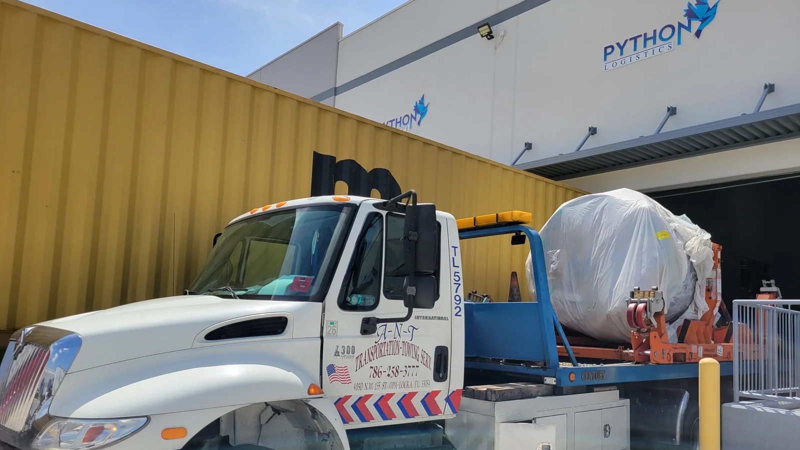 Wrapped aerospace component on a truck outside the Python Logistics facility.