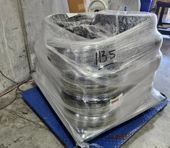 Small wrapped aerospace component on a pallet.