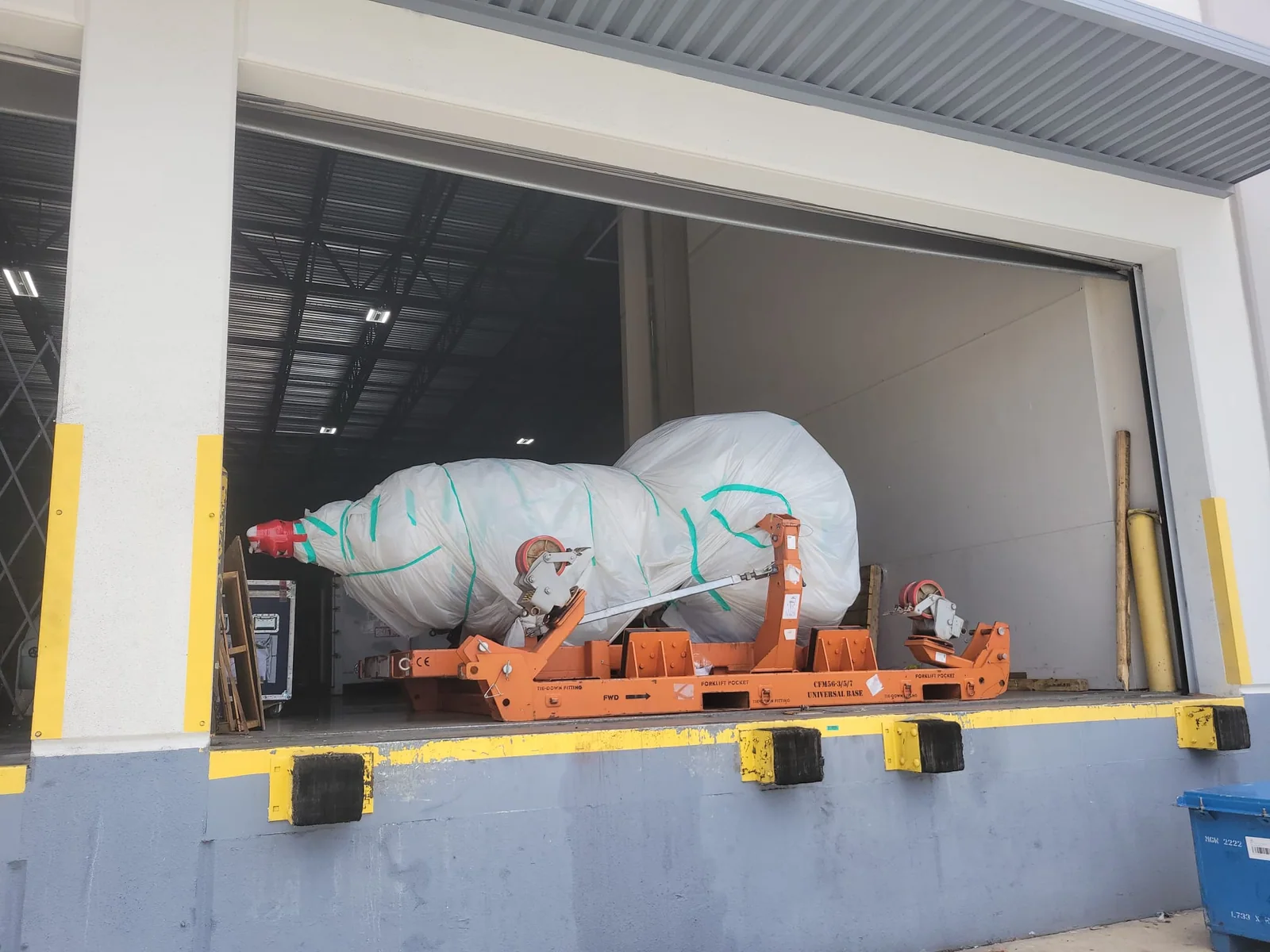 Wrapped component seen through the facility loading door.