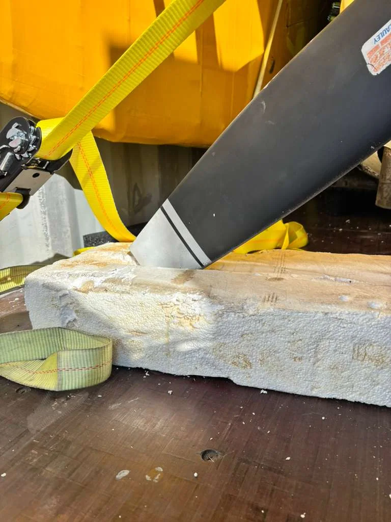 Detail of the propeller and protective supports inside the container.