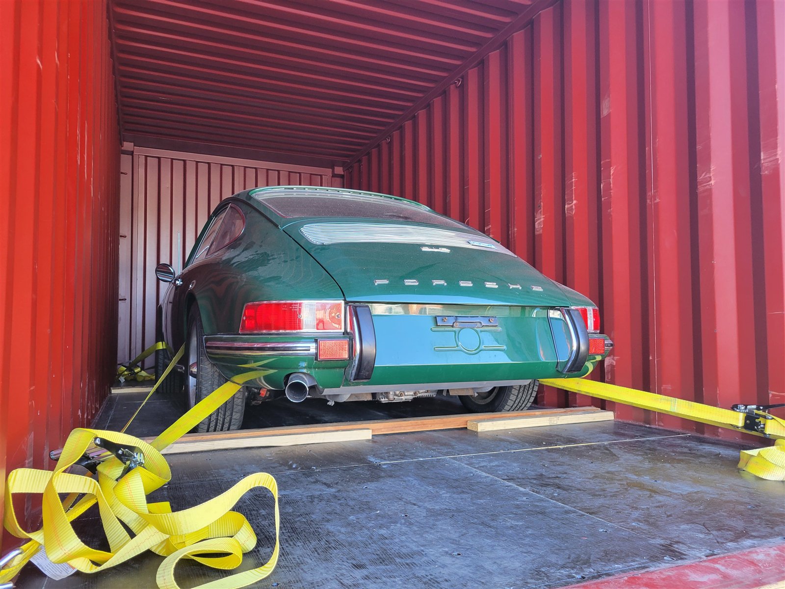 Collector car secured inside a container for export